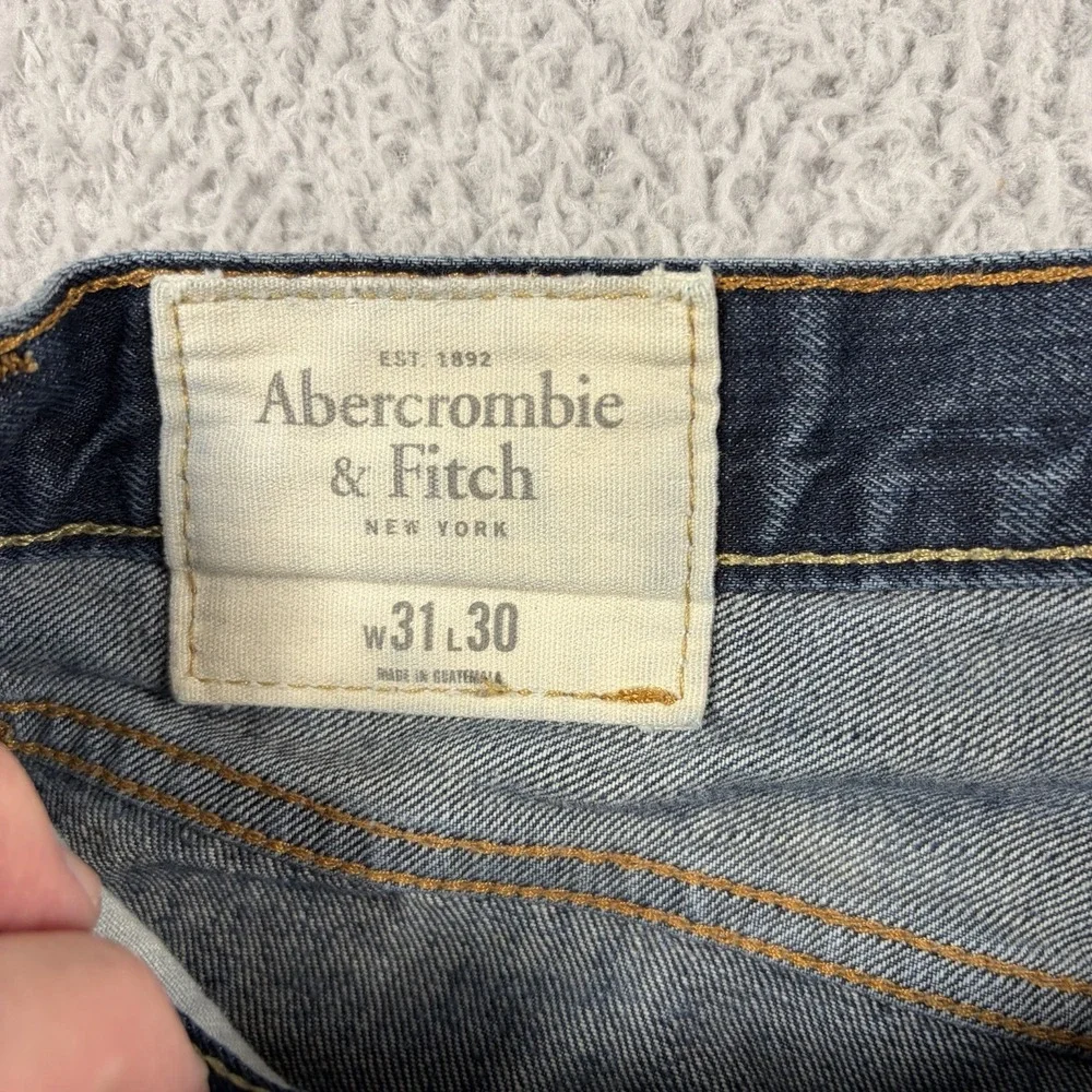 Abercrombie & Fitch distressing throughout